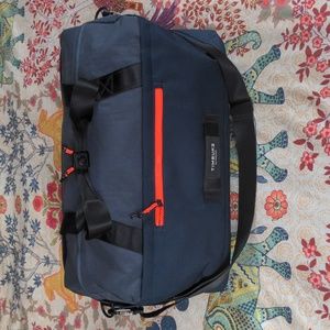 TIMBUK2 Player Duffle Bag NWOT (Blue/Grey/ Orange accents)